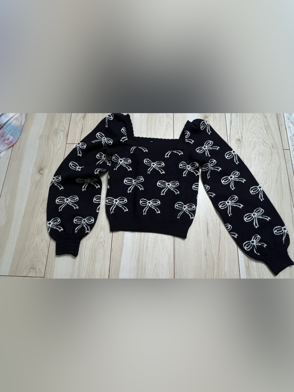 Black Off-the-Shoulder Bow-Pattern Sweater